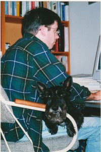 Liam Shay and his Scottish Terrier, Macduff, hard at work writing.